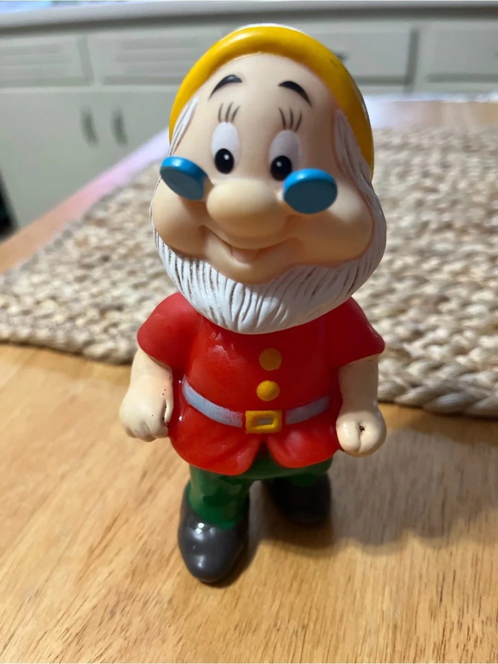 Disney Doc Figurine in Red Coat and Yellow Hat